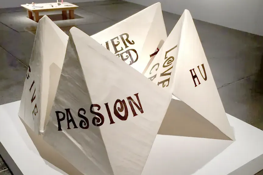 3 foot tall sculpure of kids paper toy, fortune teller